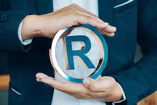 Símbolo de marca registrada protegida pela natal marcas e patentes em natal rn
